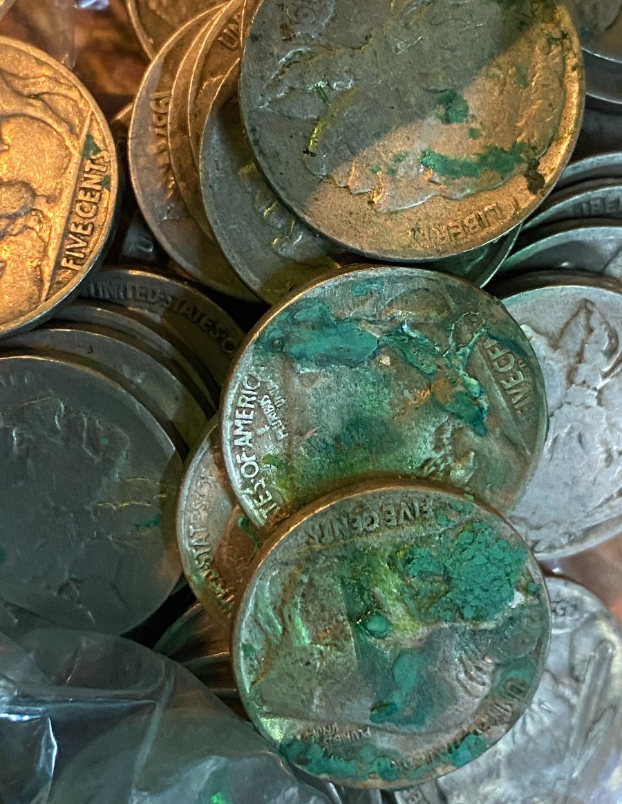 Cleaning-Buffalo-Coins-With-Sticky-Green-Mess
